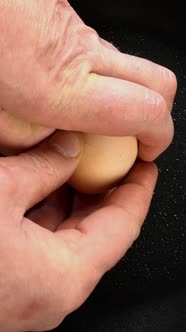 Preparation Fried Eggs in Frying Pan for Breakfast on Stove on Domestic or Restaurant Kitchen alt