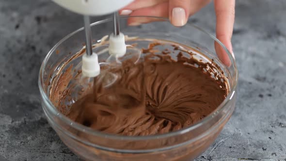 Mixing Chocolate Dough or Batter for Baking Cakes Cookies Pastry