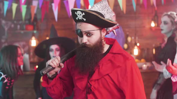 Evil Pirate Dancing at a Fun Halloween Party with His Scary Friends alt