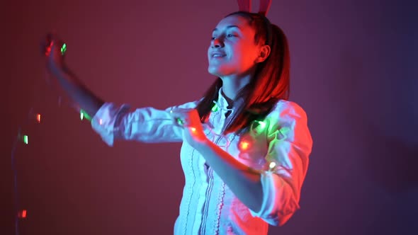 New Year or Christmas Party Preparation. Woman in Festive Outfit Dancing Carefree alt