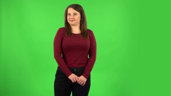 Pretty Girl Worrying in Expectation Then Smile and Proud of Herself. Green Screen alt