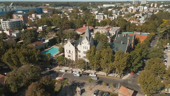 Aerial establishing shot of Buenos Aires Rowing Club in Tigre city at daytime. Dolly in alt