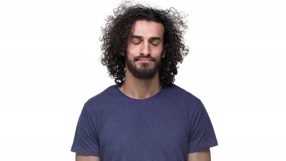 Portrait of Masculine Brunette Man Shaking Head Meaning Rejection or Disagreement Over White alt