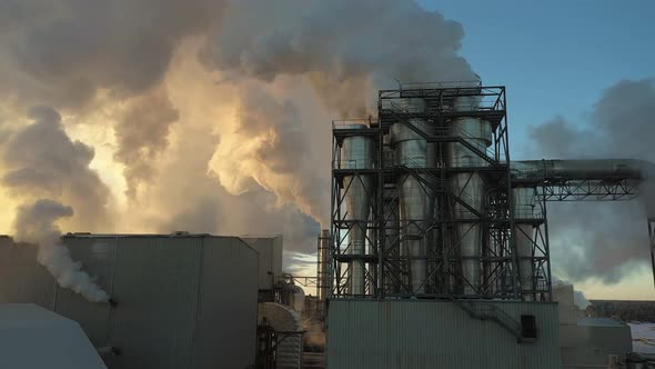 Polluted Smoke is Billowing From the Pipes of an Industrial Plant
