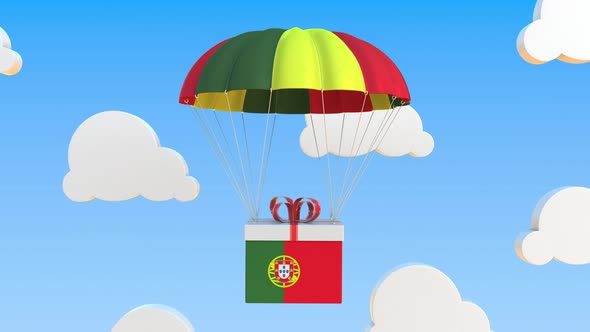 Box with National Flag of Portugal Falls with a Parachute alt