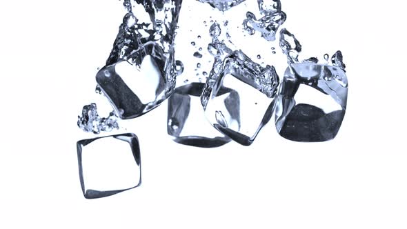 Super Slow Motion Shot of Ice Cubes Falling Into Water at 1000Fps alt