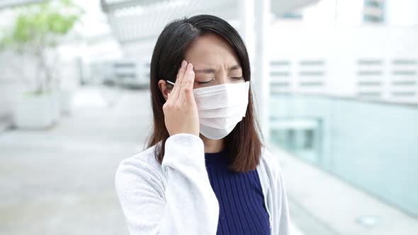Woman feeling sick at outdoor