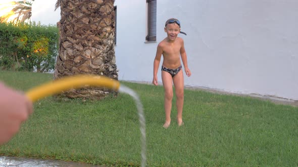 Fun with water on hot summer day alt