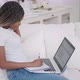 Young African Woman Sit on Couch at Home Talk By Webcam Video Conference Call Chatting with Distance - VideoHive Item for Sale