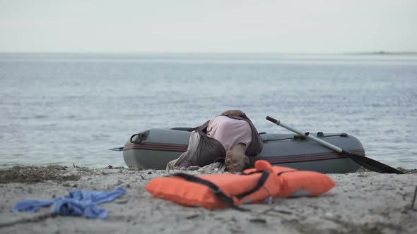 Unconscious Girl Lying On Boat Near Beach Drowned Swimmer Shipwreck