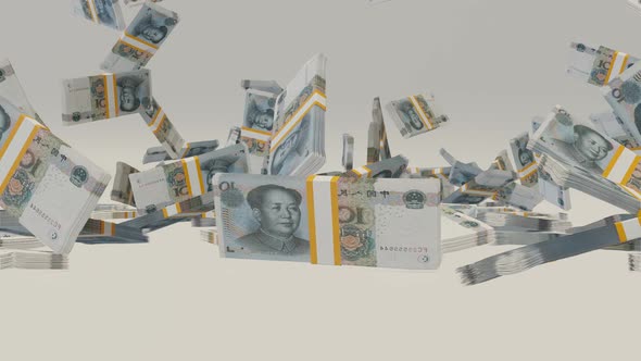 Many wads of money falling on table. 10 Chinese Yuan banknotes. alt