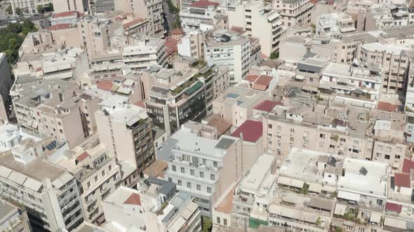 Aerial Overhead Top Down View of Athen, Greece City Apartment Building and Streets in Summer alt