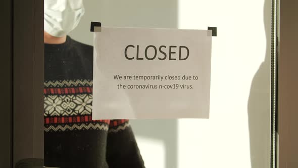 Waiter Turn Open Close Sign Entrance Door While Reopening Cafe During Covid19 alt