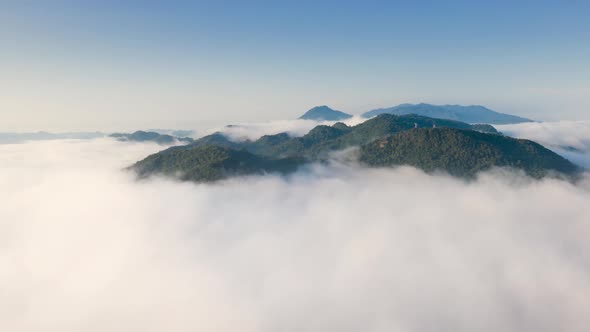 Landscape in the morning time during sunrise with fog above the mountain, alt