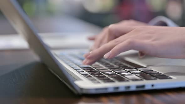 Female Hands Typing on Laptop, Close Up alt