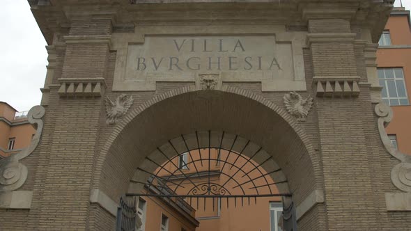 Tilt up view of an entrance in Villa Borghese, Rome