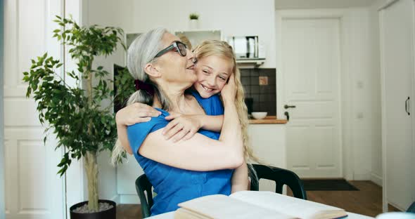 Grandmother and Granddaughter Hugging