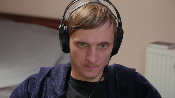 Focused Man Playing Games Closeup alt