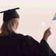Education in Europe  Graduate in Mantle and Cap with Sweden Flag in Hand - VideoHive Item for Sale