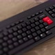 Avoid red button on keyboard. A finger presses Enter. Click AVOID. Realistic keyboard wideshot - VideoHive Item for Sale
