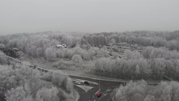 Urban Farm in Frozen Winter Landscape Aerial Reveal alt