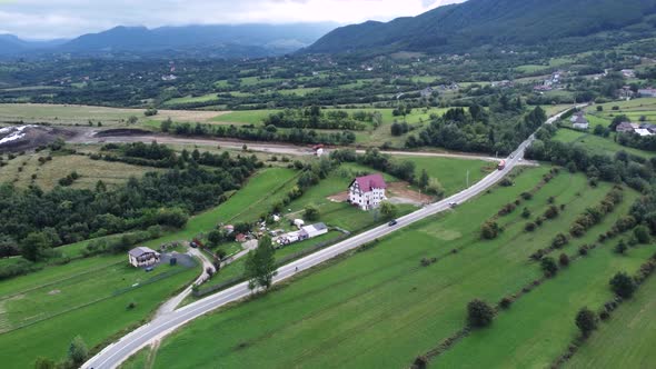 A Singlehouse Centered Footage in Close to a Small Village in the Mountains