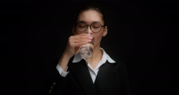 Woman Drinks Cold Water and Feels a Sharp Toothache