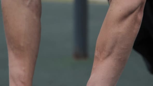 Man training outdoors on sports field