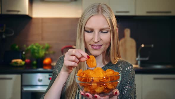 Glad Woman Eating Potato Chips alt