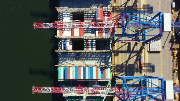 Container ship in export and import business and logistics delivery. Shipping cargo to harbor by cra alt