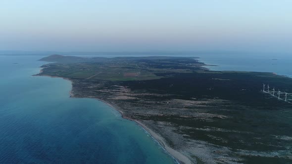 Vast Island And Wind Turbines Aerial View