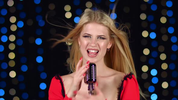 Girl Sings Energetic Songs, From the Wind Her Hair Fluttered in Different Directions alt