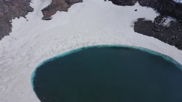 Flying Backwards From the Blue Lake in the Crater of Gorely Volcano