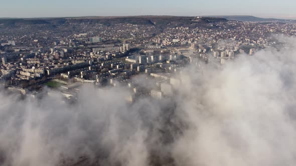 the City in the Fog at the Summer Day Aerial View alt