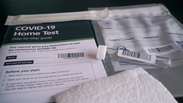 Covid-19 Coronavirus home test kit with guide, test tube and cotton q tip alt