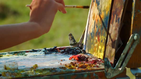Painter Hand Drawing Oil Paints Outdoor alt