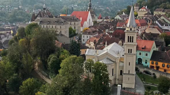 Aerial drone view of the Historic Centre of Sighisoara, Romania. Old buildings alt