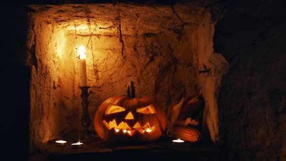 Pumpkin glows on Halloween night. Halloween concept in 4K
