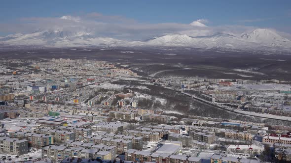 Winter Top View of Petropavlovsk City on Background Active Volcanoes Time Lapse