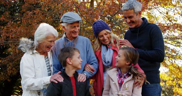 family together outdoors alt