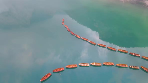Beautiful Landscape of Braies Lake Lago Di Braies Romantic Place with Wooden Bridge and Boats on the alt