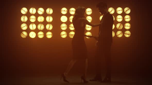 Sensual Pair Dancing Sexy Dance in Nightclub Lights alt