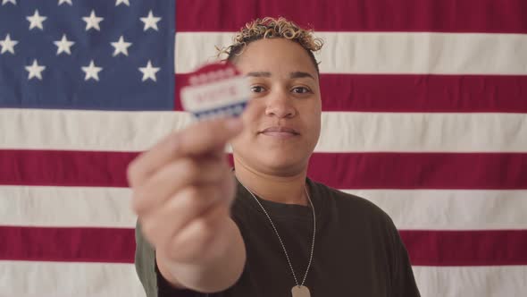 Portrait of Biracial Military Woman with Vote Sticker on Elections Day alt