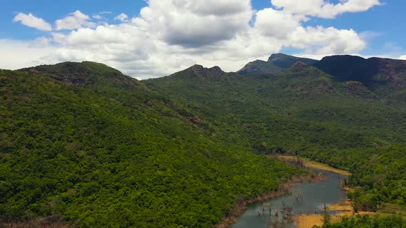 Top View of Mountain Landscape with a Lake alt