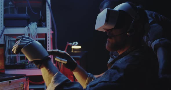 Soldier Using VR Headset and Gloves alt