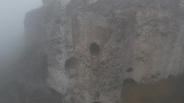 Abandoned Cave Village Khndzoresk in Armenia Aerial View in Fog