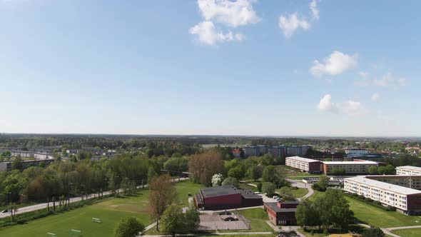 City park and living district with apartment buildings of Norrkoping, aerial drone view alt