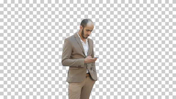 Young man in suit walking and sending, Alpha Channel