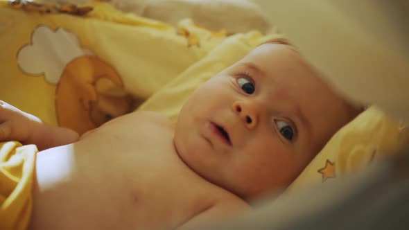 Authentic Close Up Footage of a Cute Newborn Baby Lying on the Back in Child alt