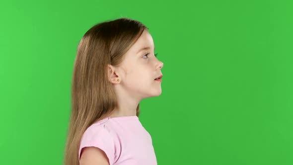 Baby Speaks Into a Shout. Green Screen. Side View alt